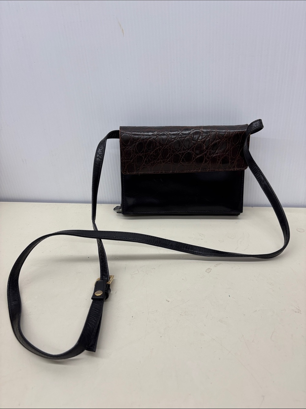 Tusk Mini Two-Tone Black and Dark Brown Built in Wallet Leather Crossbody Bag